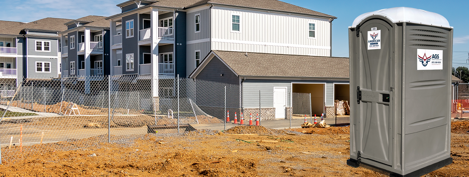 porta potty rental at apartment building construction wider view