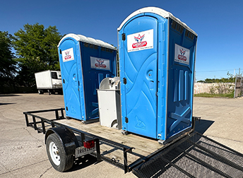 porta potties on field trailer